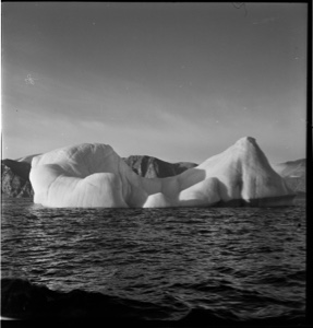 Image: Large iceberg, wave washed