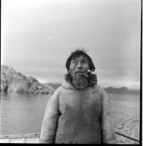 Image of Pond Inlet man with pipe