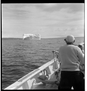 Image: Jack by rail with camera, looking at iceberg