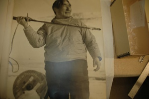 Image of Inuit man holding harpoon in throwing position