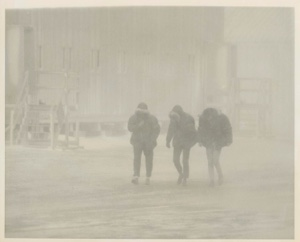 Image of Three men walking in snow storm, Thule AFB