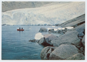 Image: Two men in small boat near glacier (postcard)