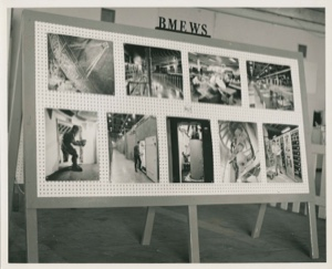 Image of BMEWS free-standing display board with 9 photos 