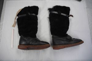 Image of Pair of black sheepskin and leather boots