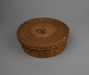 Image: Ash basket with braided grass and loop on lid
