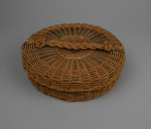 Image: green ash basket with braided grass and cording