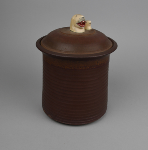 Image of Stoneware Jar with Lid and Two Seal Heads