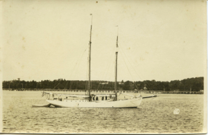 Image: Schooner in Harbor with Crew Aboard