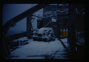 Image of Naval ship deck covered in snow.