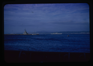 Image of Naval ships on the water.
