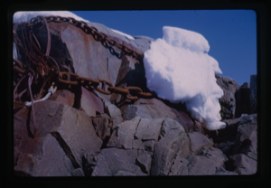 Image of Metal chains and wire on rocks