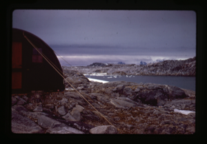 Image of Weatherhaven shelter on rocky shore