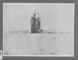 Image: The Roosevelt iced in, with sails drying, at Cape Sheridan