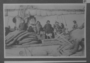 Image of ? and Eskimos, including girls, on deck of the Roosevelt