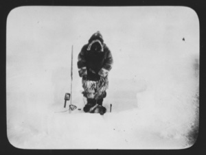 Image of [Eskimo [Inuk] working at seal hole]