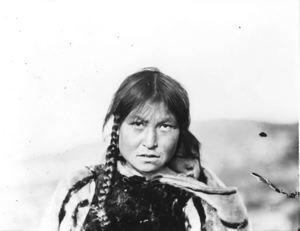 Image of Eskimo [Inuk] woman with baby