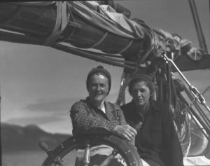 Image of Miriam MacMillan and Katie Hettasch at wheel of Bowdoin