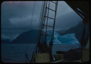 Image of Iceberg through rigging; angry sky