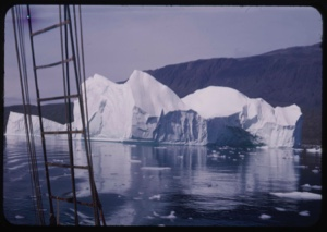 Image: Iceberg and reflection through rigging