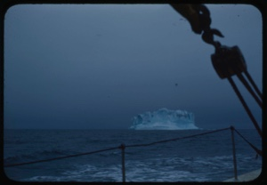 Image of Iceberg through rigging; in fog