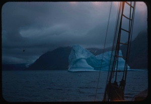 Image of Iceberg through rigging; stormy sky