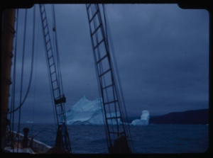 Image: Iceberg through rigging; angry sky