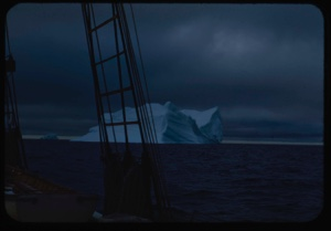 Image of Iceberg through rigging, storm clouds