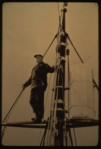 Image of Donald MacMillan in rigging