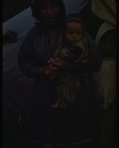 Image of Nascopie mother and children by their tent [Mani-Adele Mistanapeo and child]