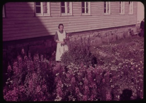Image of Young woman in garden