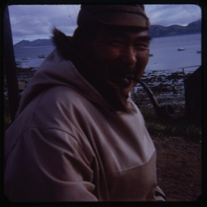 Image of Eskimo [Inuk] man with pipe