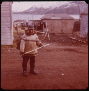 Image: Eskimo [Inuk] man with bow saw