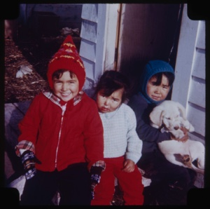 Image: Three Eskimo [Inuit] children with a dog