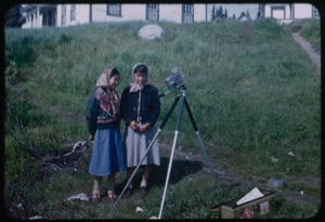 Image: Two teenage girls by Platt's camera equipment at school
