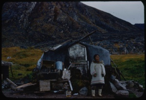 Image of Eskimo [Inuk] grandmother by tent