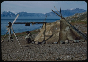 Image: Eskimo [Inuk] man by sealskin tent