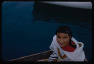Image of Eskimo [Inuk] girl in boat