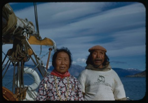 Image of Elderly Eskimo [Inuit] couple aboard (man wearing Dartmouth shirt)