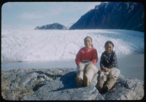 Image: Young women and boy sitting by Brother John's Glacier