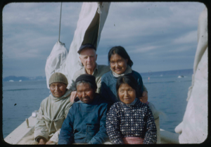Image of Ootaq, Harrigan [Inukitooq], Donald MacMillan, and two woman from NP Expedition