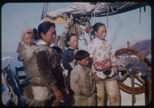 Image of Eskimo [Inuit] women and children aboard