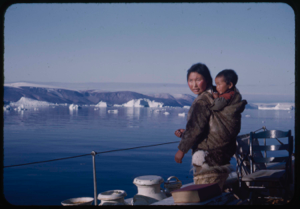 Image of Eskimo [Inuit] mother and child aboard