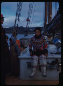 Image of Miriam MacMillan and Eskimo [Inuk] girl in traditional dress, aboard