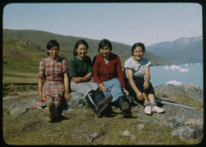 Image of Four Eskimo [Inuit] women sitting, in western dress