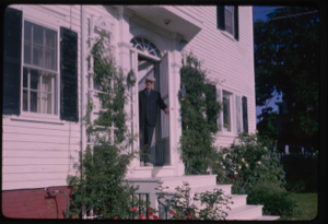 Image: Donald MacMillan at front door