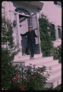 Image of Donald MacMillan at front door