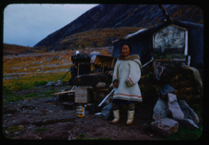 Image: Eskimo [Inuk] grandmother outside her home
