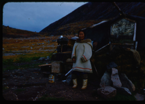 Image of Eskimo [Inuk] Grandmother outside her home