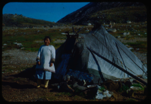 Image of Eskimo [Inuk] grandmother by skin tupik