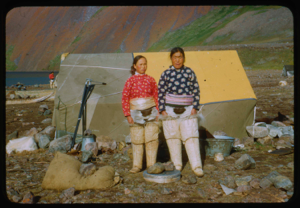 Image of Two Polar Eskimo [Inughuit] women by canvass tent